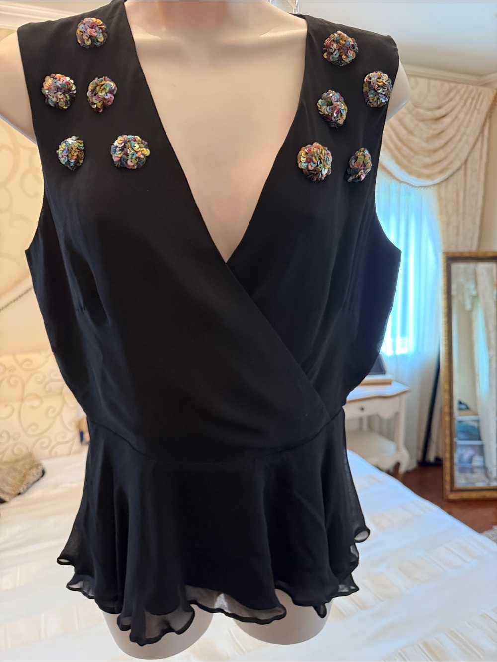 Black Sleeveless Peplum Top with Multicolor Embellishments